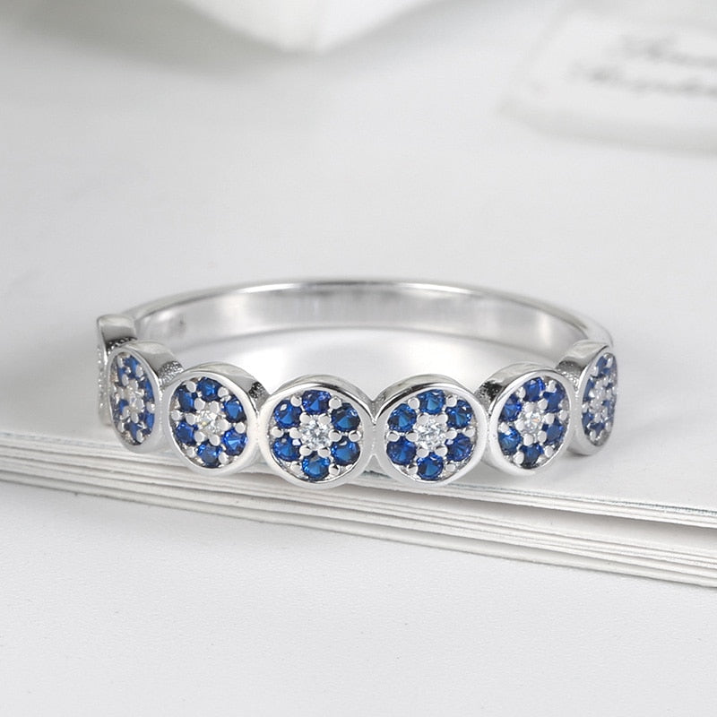 Eyelet Designer Blue CZ and 925 Serling Ring